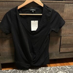 Stella & dot black sweatshirt - small NWT . Knit detail at bottom center